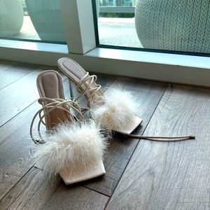 Cream feather detail heels. Very comfortable and so stylish!